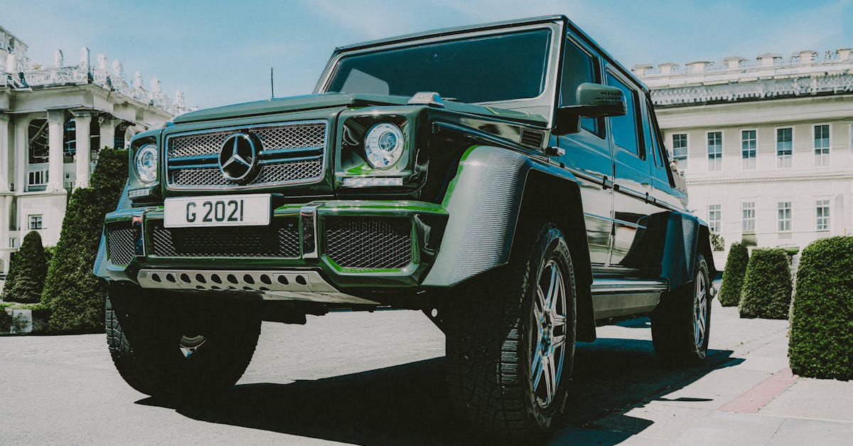 Green luxury SUV parked in an urban area of London, showcasing elegance and automotive design.